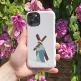 Close-up of a Christian iPhone case featuring a graphic image of Jesus with the cross on a bright floral backdrop.