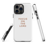 Minimalist design iPhone case with 'FOCUS ON THE LORD' inscription, combining simplicity with spiritual devotion.
