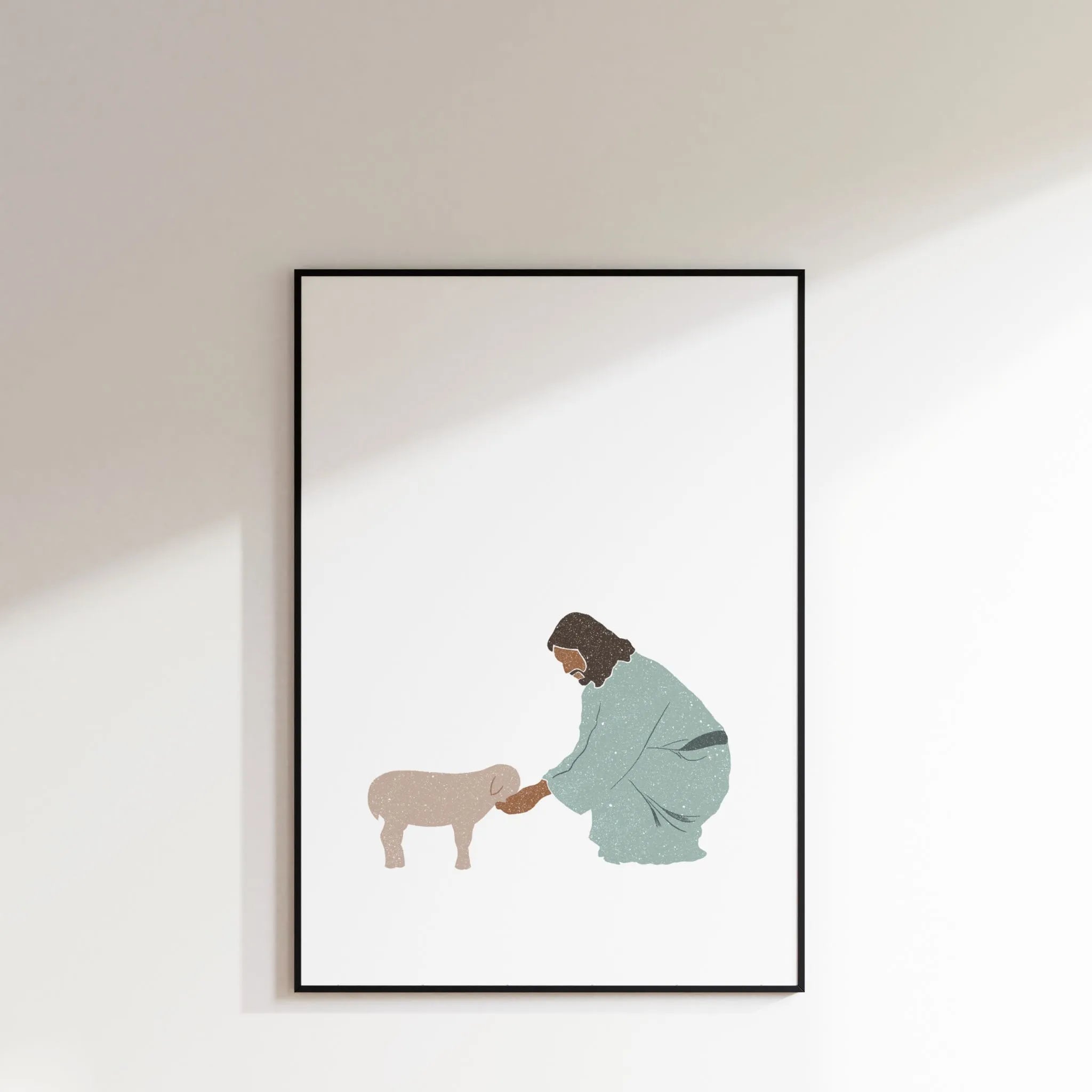 Good Shepherd printable Christian poster in thin black frame on white wall, modern décor.