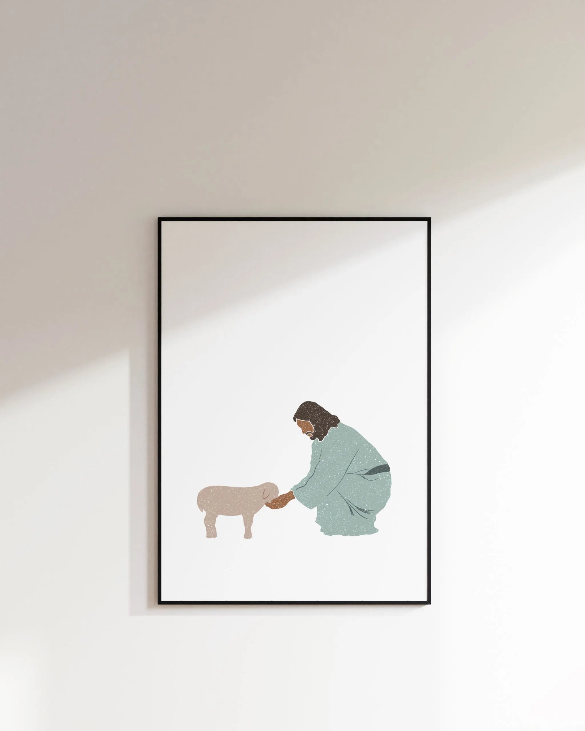 Good Shepherd printable Christian poster in thin black frame on white wall, modern décor.