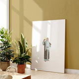 Light of the World printable Christian art in lightwood frame beside plants, modern minimalist décor.