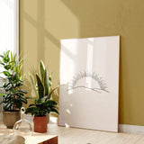 “Morning of Joy” sunrise line art framed near plants, minimalist printable wall art.