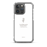 Clear white Christian iPhone case with “1 Corinthians 16:14” verse on iPhone 15 Pro Max, back view.