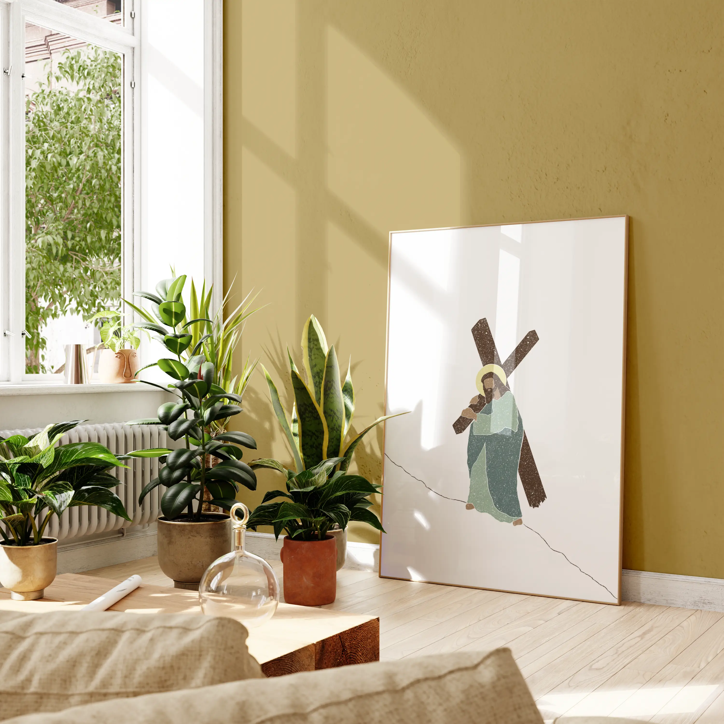 “Weight of Mercy” framed Christian artwork in bright room with plants.
